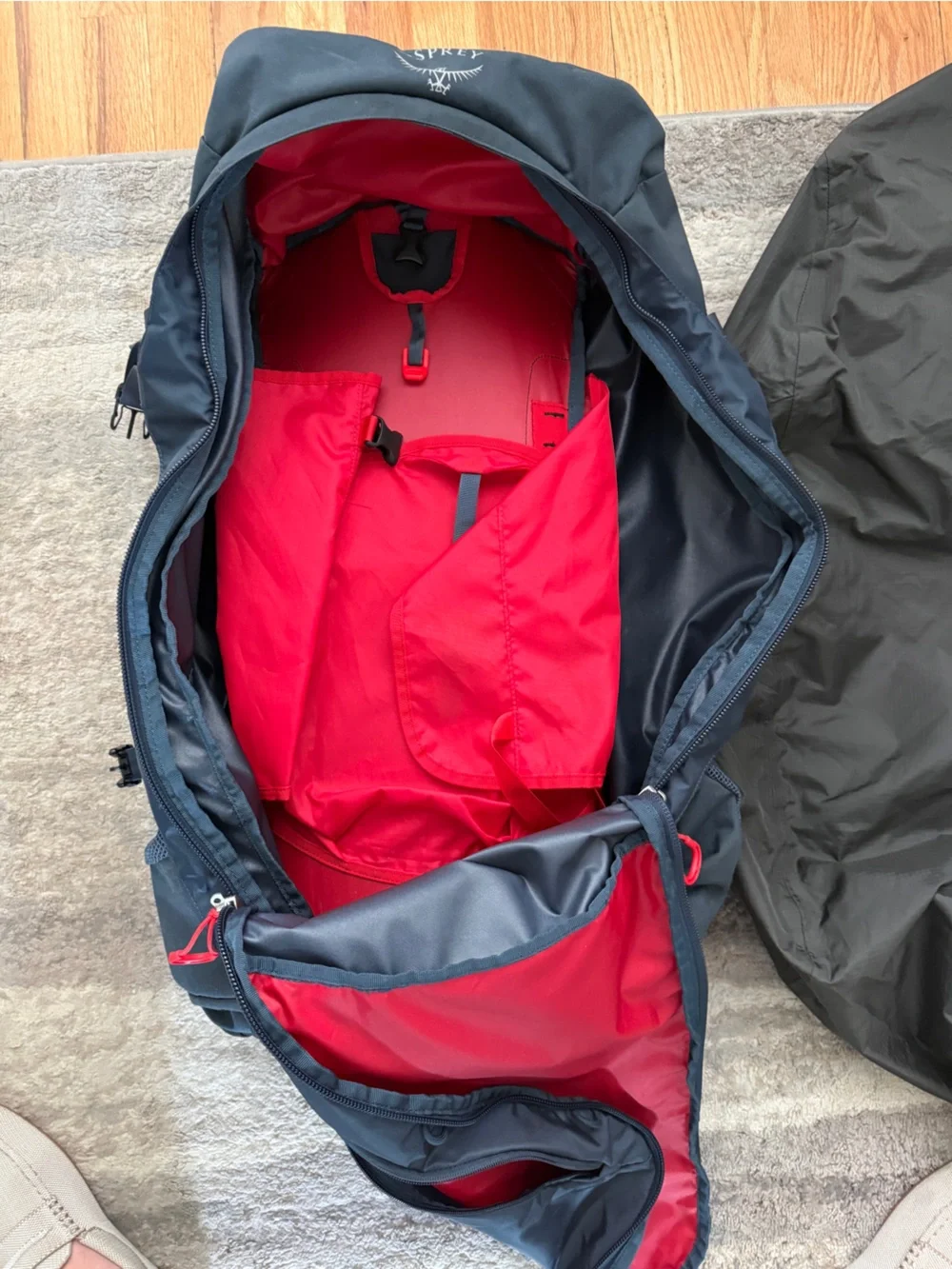 OSPREY Farpoint Trek 55L Backpack - Muted Space Blue w Red Accents
